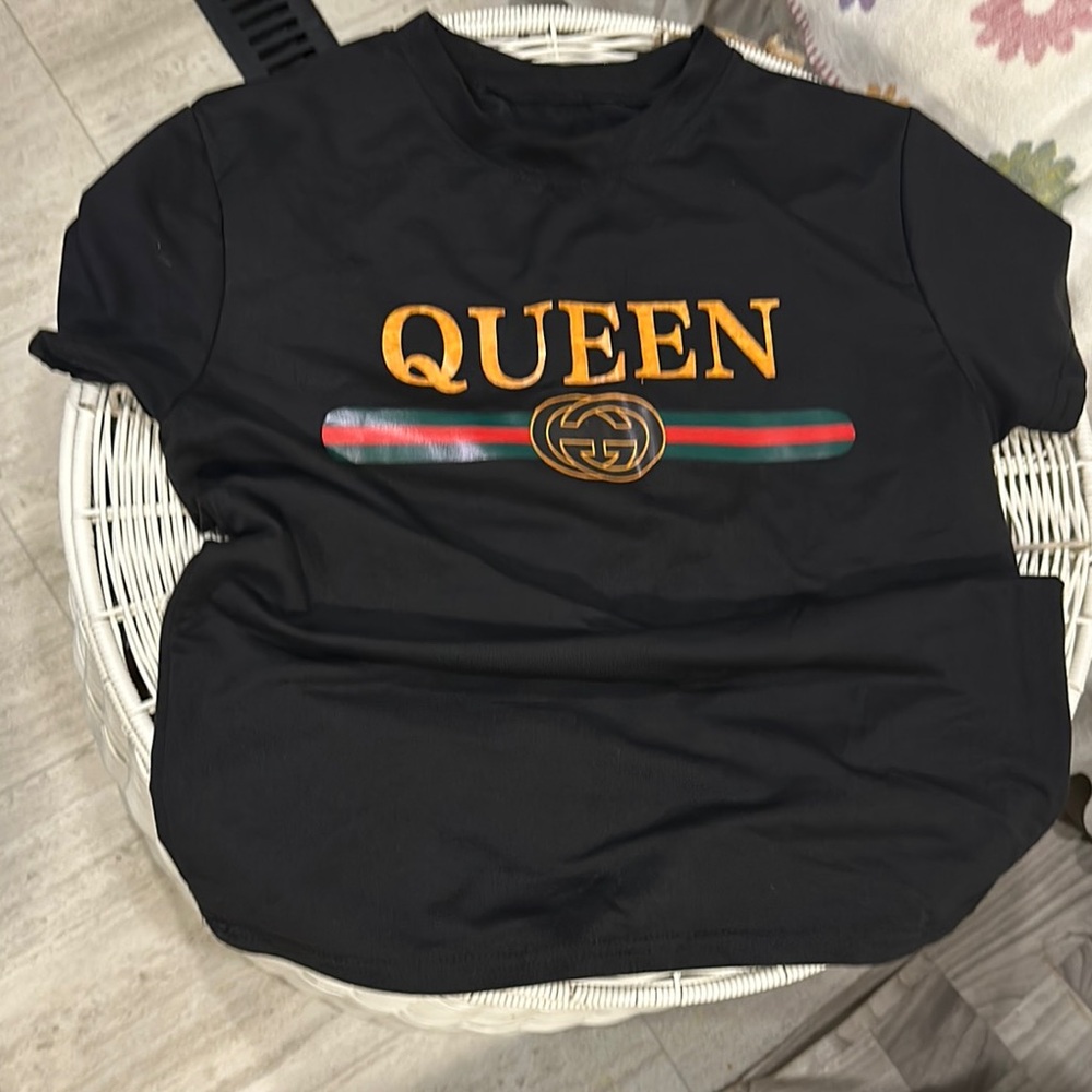 Not Rated Black Tee with Gold and Red Accents